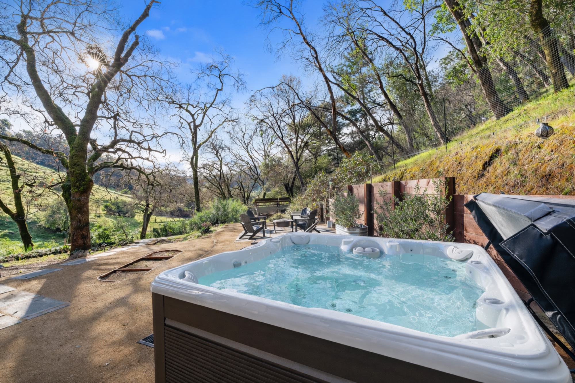 Hot tub with hillside views